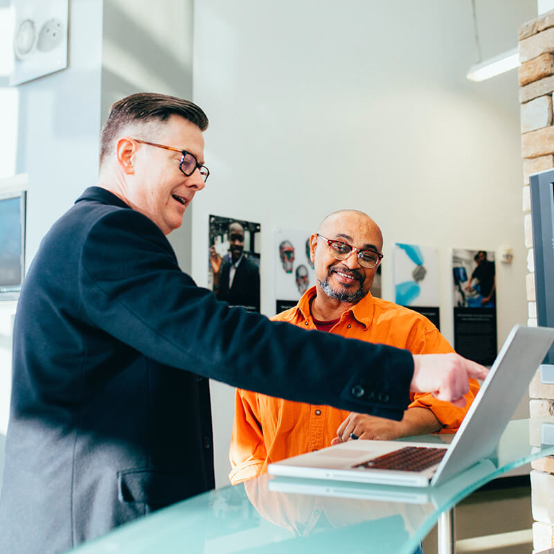 People reviewing an operational system together